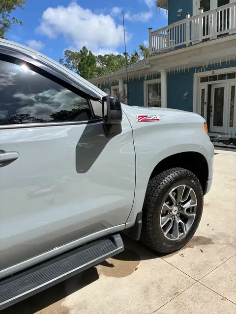 Light gray Chevrolet Silverado Z71 pickup after an exterior detail